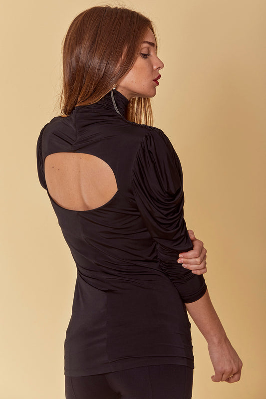 Jersey statement top with fitted, hip length design, ruched mock neck, long draped sleeves and open back cutout in black.